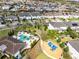 Bird's eye view of the community, complete with a playground and a sparkling community pool at 8390 Ludington Cir, Orlando, FL 32836