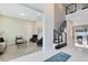 Bright living room featuring modern decor, contemporary furnishings, and wood floors at 8390 Ludington Cir, Orlando, FL 32836