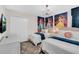 bedroom features twin beds, whimsical wall decor, and soft carpeting at 8824 Cruden Bay Ct, Davenport, FL 33896