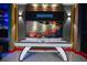 Fun game room with air hockey table and vintage arcade games at 8824 Cruden Bay Ct, Davenport, FL 33896