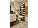 Well-maintained bathroom with updated vanity, granite countertops, and shower-tub combination at 940 Douglas Ave # 170, Altamonte Springs, FL 32714