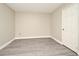 Bedroom featuring neutral walls, updated flooring, and closet at 940 Douglas Ave # 170, Altamonte Springs, FL 32714