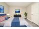 Bedroom with a queen bed and blue accents at 940 Douglas Ave # 170, Altamonte Springs, FL 32714