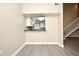 Dining area has a pass through to the kitchen and the staircase at 940 Douglas Ave # 170, Altamonte Springs, FL 32714