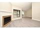 The living room features a fireplace with wood-look flooring at 940 Douglas Ave # 170, Altamonte Springs, FL 32714