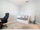 Bedroom featuring a daybed with decorative pillows, complemented by a chair and workspace at 9542 Beautiful Way, Winter Garden, FL 34787