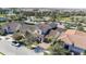 Aerial view of a residential neighborhood with multiple homes, palm trees, and lush green landscaping at 10209 Henbury St, Orlando, FL 32832