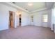 Spacious bedroom with walk-in closet and large windows providing natural light at 10209 Henbury St, Orlando, FL 32832