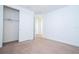 Bedroom features a closet, carpeted flooring, and neutral colored walls at 10209 Henbury St, Orlando, FL 32832