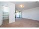 Bedroom with a large walk-in closet and sliding doors that open up to the balcony at 10209 Henbury St, Orlando, FL 32832