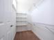 Walk-in closet with adjustable shelving for easy organization and ample storage at 10209 Henbury St, Orlando, FL 32832