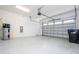 Spacious two-car garage with water heater on the left and with ample space for parking and storage at 10209 Henbury St, Orlando, FL 32832