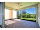 Screened in patio area with brick floors and ceiling fan overlooking the backyard at 10209 Henbury St, Orlando, FL 32832
