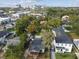 Houses and cityscape aerial view including a small shed in one backyard at 125 E Grant St, Orlando, FL 32806