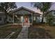 Charming home with a covered porch and a welcoming entrance at 125 E Grant St, Orlando, FL 32806