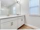 Modern bathroom features double sinks, granite countertops, and modern fixtures at 16207 Point Rock Dr, Winter Garden, FL 34787