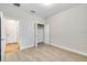 Comfortable bedroom offers neutral carpet and closet for easy storage options near the entry door at 16207 Point Rock Dr, Winter Garden, FL 34787