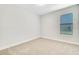 Cozy bedroom with neutral carpet and good natural light from a window, perfect for relaxation at 16207 Point Rock Dr, Winter Garden, FL 34787