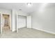 Bedroom featuring neutral colors, carpet, and a closet with a door in the background at 16207 Point Rock Dr, Winter Garden, FL 34787