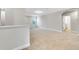 Neutral bonus room offers a serene atmosphere, featuring neutral carpet and paint at 16207 Point Rock Dr, Winter Garden, FL 34787