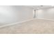 Bonus room with neutral carpeting and paint, bathed in natural light at 16207 Point Rock Dr, Winter Garden, FL 34787
