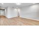 Open living room with tiled floor and recessed lighting offers lots of space to customize furniture arrangements at 16207 Point Rock Dr, Winter Garden, FL 34787