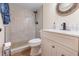 Bathroom with a glass door shower, tiled walls, and a modern vanity at 169 Fallwood St, Fern Park, FL 32730