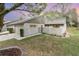 Charming home featuring an attached garage, small yard, and clean lines creating a cozy curb appeal at 169 Fallwood St, Fern Park, FL 32730