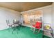 View of the lanai featuring outdoor seating and a glimpse into the bright, airy living room at 169 Fallwood St, Fern Park, FL 32730
