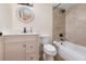 Updated bathroom with tile shower, modern vanity, and neutral color palette at 169 Fallwood St, Fern Park, FL 32730