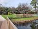 A neighborhood park features a playground, a covered picnic area, and access to a pond at 169 Fallwood St, Fern Park, FL 32730