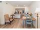 Bright dining room with wood floors, natural light, and an open floor plan at 169 Fallwood St, Fern Park, FL 32730