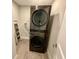 New front-load washer and dryer set in laundry room with painted walls and tile floors at 171 Church St, Geneva, FL 32732
