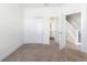 Bright bedroom with plush carpeting, ensuite bathroom, and convenient closet space at 17442 Hidden Forest Dr, Clermont, FL 34714