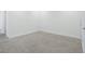 Clean bedroom with neutral carpet and modern trim at 17442 Hidden Forest Dr, Clermont, FL 34714