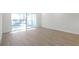Living room with sliding glass doors to a pool at 17442 Hidden Forest Dr, Clermont, FL 34714