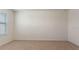A bedroom featuring a window with blinds and neutral-painted walls with carpeted flooring at 18046 Cider Mill Ln, Winter Garden, FL 34787