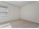 Bedroom featuring a window with blinds, carpet floors, and neutral-painted walls at 18046 Cider Mill Ln, Winter Garden, FL 34787