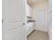 Well-organized pantry with storage cabinets and granite countertop at 18046 Cider Mill Ln, Winter Garden, FL 34787