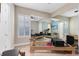 Bright gym area with mirrored walls, exercise equipment, and natural light at 18405 Mowry Ct, Orlando, FL 32827