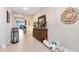 Bright hallway with wood floors, accent furniture, and decor at 18405 Mowry Ct, Orlando, FL 32827