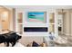 Living room featuring custom fireplace and shelving and plenty of seating for friends and Gathering at 18405 Mowry Ct, Orlando, FL 32827