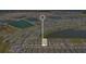 Panoramic aerial view showcasing the community's layout, proximity to lakes, and road networks at 1972 Spring Shower Cir, Kissimmee, FL 34744