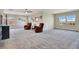 Large upstairs bonus room featuring recessed lighting, two sitting chairs, and great natural light from surrounding windows at 1972 Spring Shower Cir, Kissimmee, FL 34744