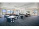 Bright community room featuring comfortable seating, tables, and large windows for natural light at 1972 Spring Shower Cir, Kissimmee, FL 34744