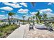 Inviting community fire pit area with comfortable seating and lush landscaping, perfect for outdoor gatherings at 1972 Spring Shower Cir, Kissimmee, FL 34744