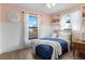 Charming bedroom features wood floors, and two windows with natural light at 2531 Ludlow St, Deltona, FL 32738