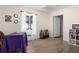 This flex space features a window seat, wood floors, and neutral paint at 2531 Ludlow St, Deltona, FL 32738
