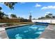 Backyard pool with a clear blue water and fence at 2531 Ludlow St, Deltona, FL 32738