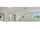 Bonus room featuring neutral walls, plush carpet, recessed lights, and several entryways at 2650 Howard Ave, Oviedo, FL 32765